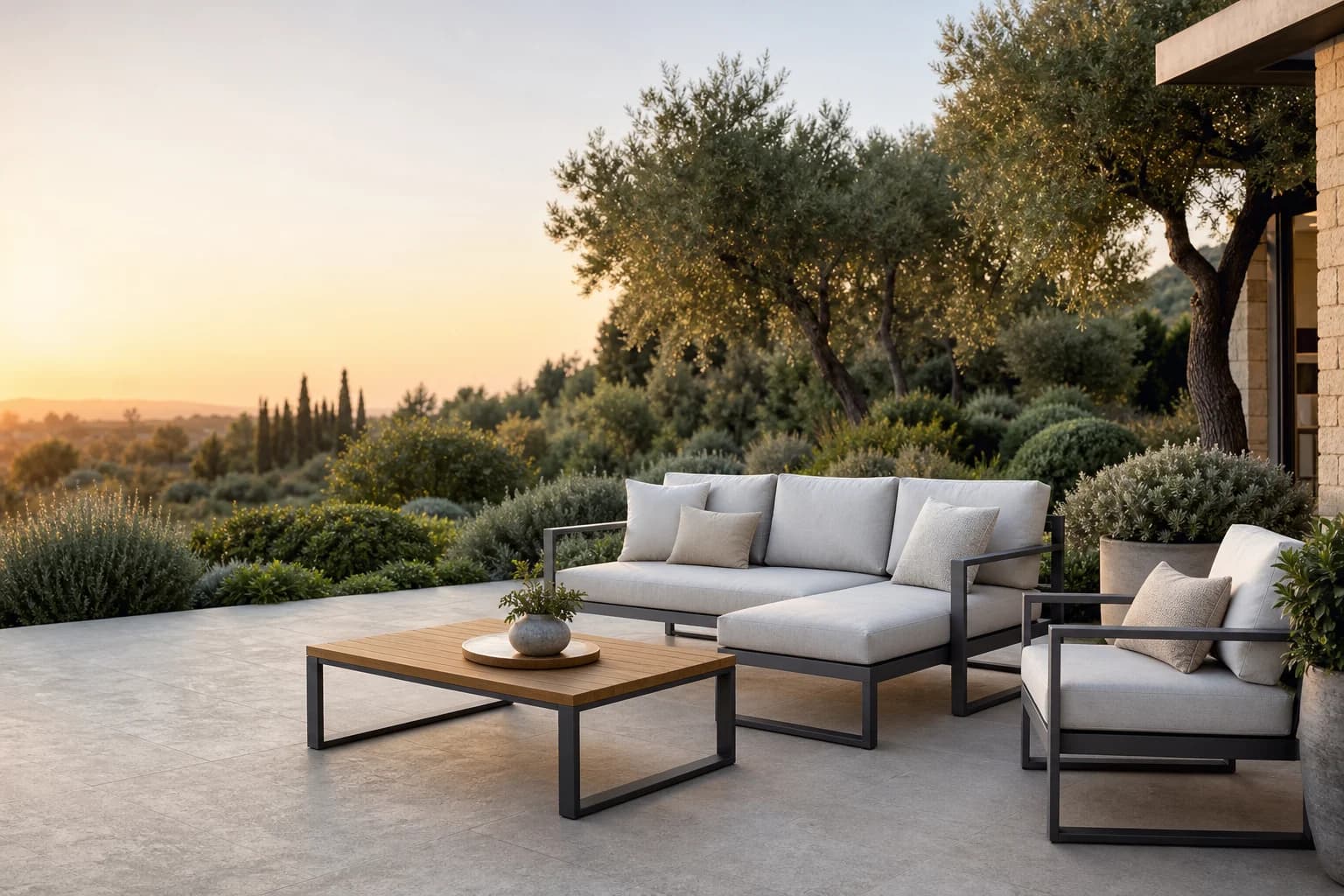 A modern lounge set on a sunlit garden terrace